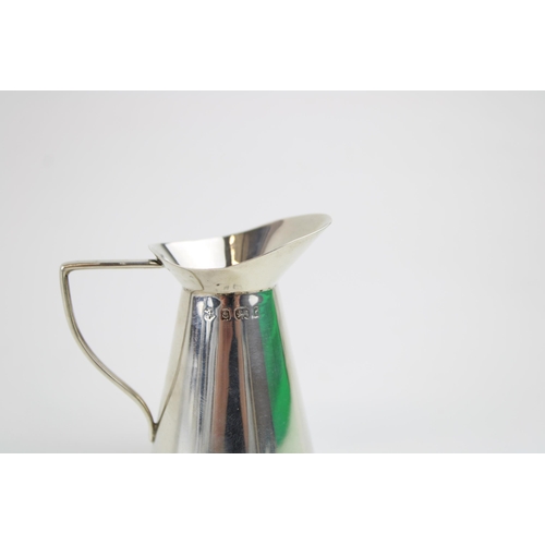 586 - Silver miniature water jug, Georgian style, Birmingham 1903, William Hutton & Sons, 35.5g, 6.5cm tal... 