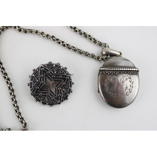 617 - A silver oval locket, beaded decoration, on silver coloured chain, with silver brooch, combined 31.2... 