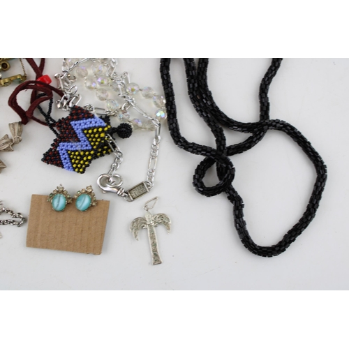 618 - A group of costume jewellery  a vintage paste necklace and matching earrings, a black beaded skein n... 