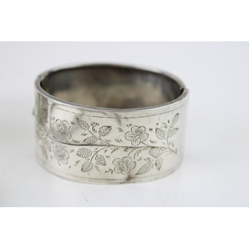 619 - A group of silver jewellery comprising a cuff bangle, marked 925, a Mexican silver bangle engraved w... 