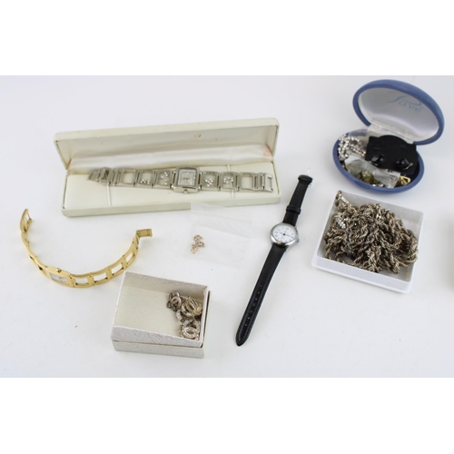 621 - A group of silver and costume jewellery including three silver rope twist chains, a silver flat curb... 