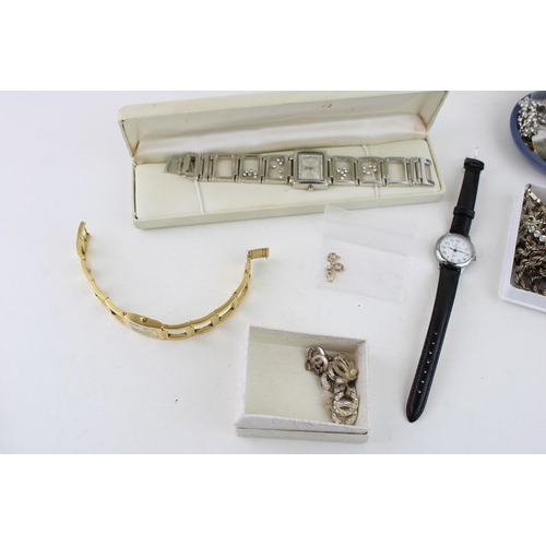 621 - A group of silver and costume jewellery including three silver rope twist chains, a silver flat curb... 