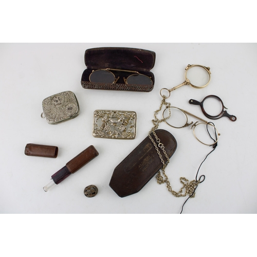 625 - Gold plated lorgnettes, pinz nez glasses, cases etc., leather cased fleam and plated coin holder.