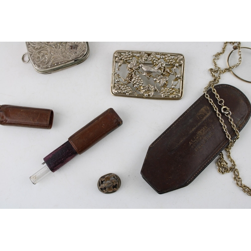 625 - Gold plated lorgnettes, pinz nez glasses, cases etc., leather cased fleam and plated coin holder.