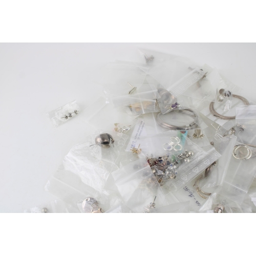 638 - A large collection of circa 90 pairs of sterling silver earrings, some gem set and some with semi pr... 