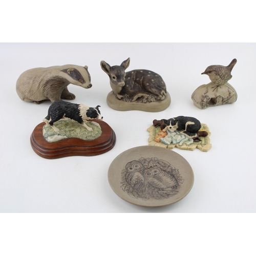 73 - A collection of Poole Pottery animal pieces with two border fine art style models