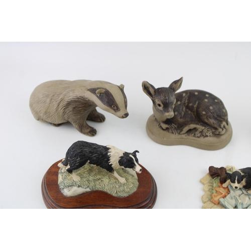 73 - A collection of Poole Pottery animal pieces with two border fine art style models