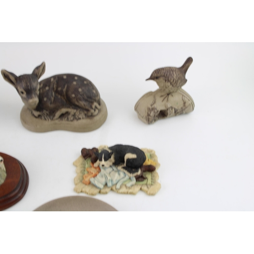 73 - A collection of Poole Pottery animal pieces with two border fine art style models