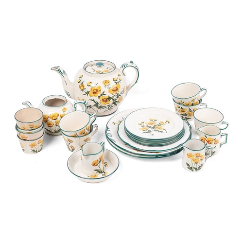 143 - Wemyss Ware in the 'Buttercup' pattern to include a large teapot, a smaller teapot (missing lid) , 5...
