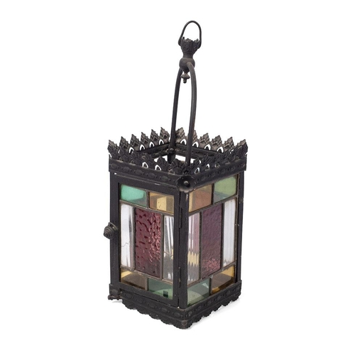 19 - A late 19th / early 20th century porch lantern, pressed steel with cast frame and stained glass pane... 