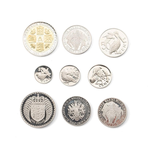 260 - A collection of Queen Elizabeth II commemorative coins including a Gibraltar crown with three half c... 