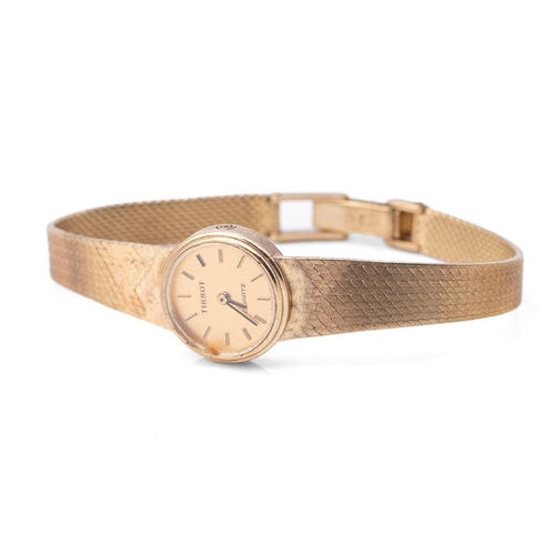 283 - A Tissot 9ct gold ladies wristwatch on a 9ct gold bracelet. gold weight including watch glass (21.4g... 