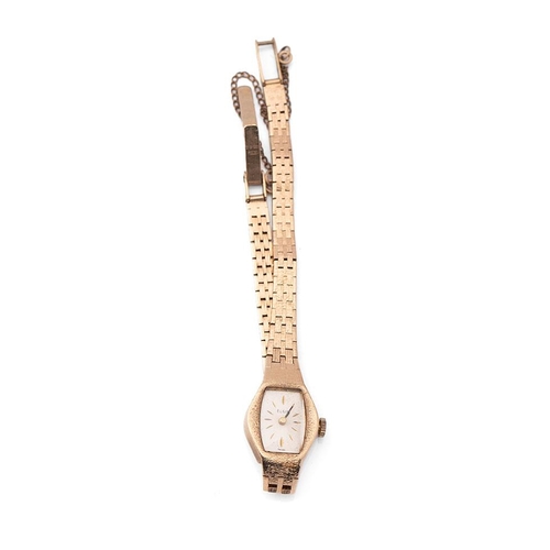 284 - An Elgin 9ct gold ladies wristwatch on a 9ct gold bracelet. Gold weight including watch glass (14.2g... 