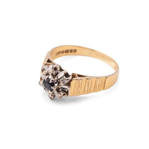 422 - An 18ct gold, sapphire and diamond flowerhead ring, of brutalist design, circa 1971, the centreal sa... 