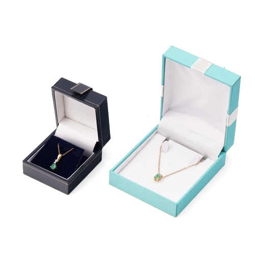 432 - A 14ct gold, diamond and emerald pendant, 0.5g, and 9ct gold chain, chain length, 46cm and another s... 