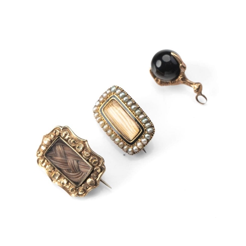 433 - A 19th century mourning brooch, set with seed pearls with black enamel border, another similar with ... 