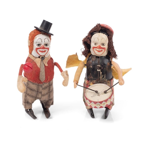 67 - Schuco No.965 Clown Juggler, red jacket and checked trousers, orange hair, black top hat, together w... 