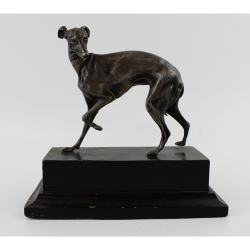 10 - After P J Mene, A 19th century silver plated bronze sculpture of a whippet / greyhound on wooden pli... 