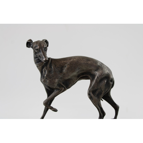 10 - After P J Mene, A 19th century silver plated bronze sculpture of a whippet / greyhound on wooden pli... 