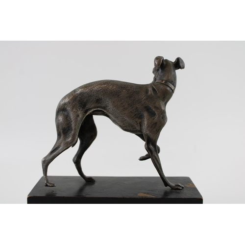 10 - After P J Mene, A 19th century silver plated bronze sculpture of a whippet / greyhound on wooden pli... 