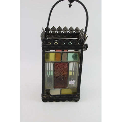 19 - A late 19th / early 20th century porch lantern, pressed steel with cast frame and stained glass pane... 