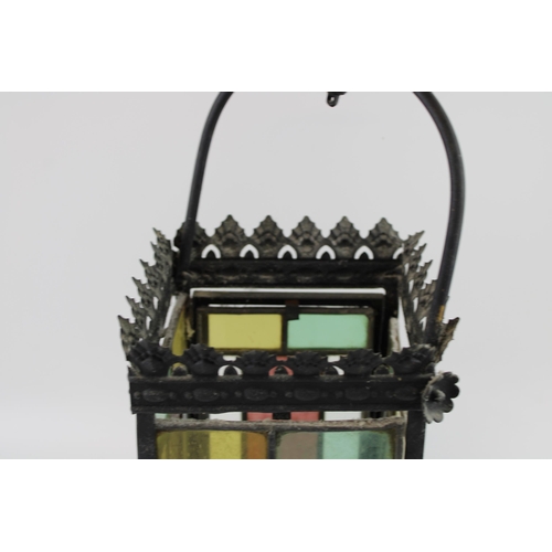 19 - A late 19th / early 20th century porch lantern, pressed steel with cast frame and stained glass pane... 