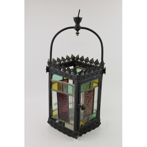 19 - A late 19th / early 20th century porch lantern, pressed steel with cast frame and stained glass pane... 