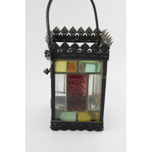 19 - A late 19th / early 20th century porch lantern, pressed steel with cast frame and stained glass pane... 