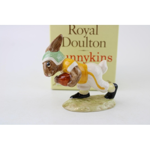 217 - Royal Doulton Bunnykins figure Touchdown DB99, in Notre Dame college colours.