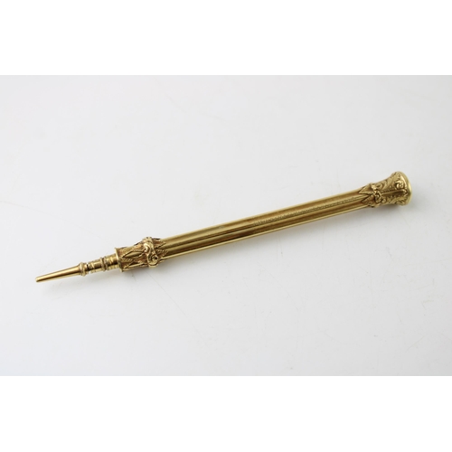 261 - Sampson Mordan & Co yellow metal mechanical pencil, acanthus and palmette decoration, 12cm long when... 