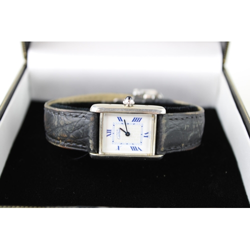 274 - A silver cased Must de Cartier tank wristwatch, the signed dial having insignia pattern to the centr... 