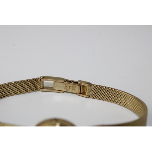 283 - A Tissot 9ct gold ladies wristwatch on a 9ct gold bracelet. gold weight including watch glass (21.4g... 