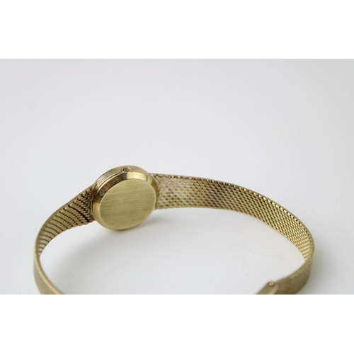 283 - A Tissot 9ct gold ladies wristwatch on a 9ct gold bracelet. gold weight including watch glass (21.4g... 