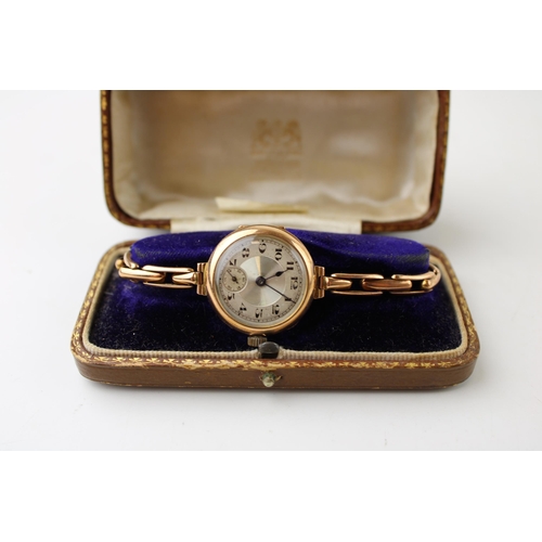 285 - A cased 9ct gold ladies wristwatch on a 9ct gold bracelet. Gross weight 21.4g.