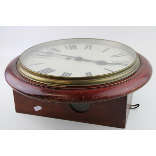 34 - A mahogany cased wall clock / school clock. Brass bezel with white dial and Roman numerals, glass wi... 