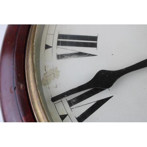 34 - A mahogany cased wall clock / school clock. Brass bezel with white dial and Roman numerals, glass wi... 