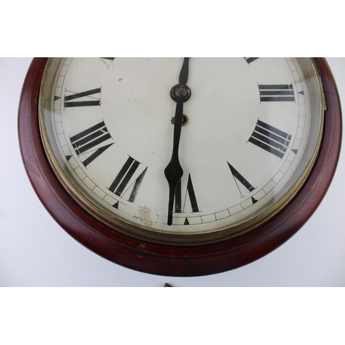 34 - A mahogany cased wall clock / school clock. Brass bezel with white dial and Roman numerals, glass wi... 