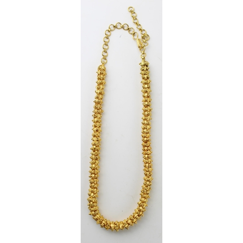 401 - A high carat gold necklace of large textured box link and bead form, originally purchased from Sifan... 