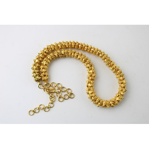 401 - A high carat gold necklace of large textured box link and bead form, originally purchased from Sifan... 