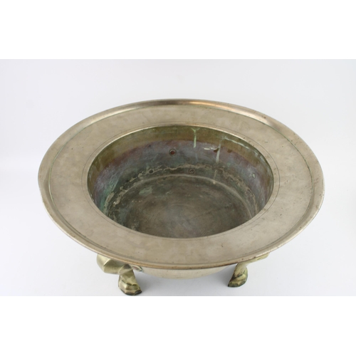 42 - A large Chinese Paktong jardiniere / bowl, riased on cast brass feet, copper rivets, 39cm diameter, ... 