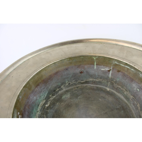 42 - A large Chinese Paktong jardiniere / bowl, riased on cast brass feet, copper rivets, 39cm diameter, ... 