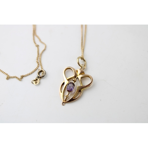 425 - An Art Nouveau 9ct gold and amethyst pendant, of swirling heart shaped form, with later jump ring an... 