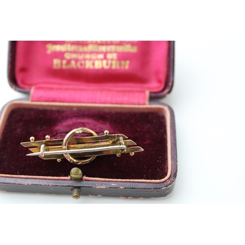 440 - A 9ct yellow gold Art Deco bar brooch / stock pin set tourmaline in period jewellery box. Width 4.5c... 