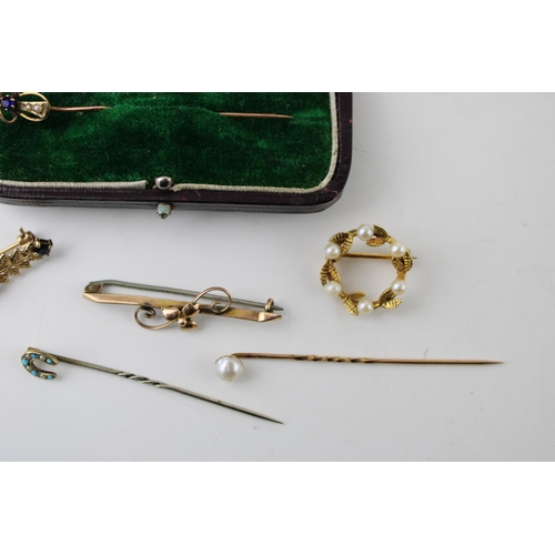 442 - A collection of vintage and antique gold jewellery to include three stick pins, (two with 9ct gold p... 