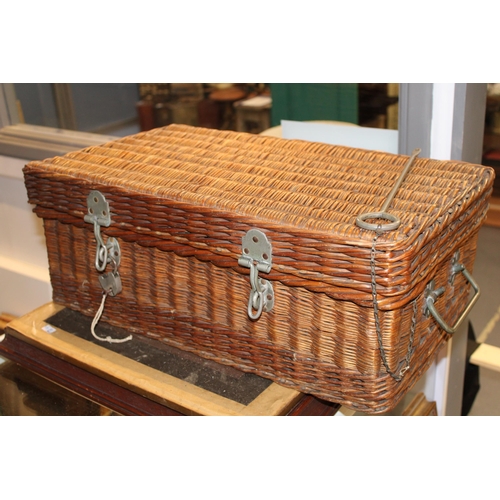 54 - A quality early c20th Picnic set in a basket hamper containing ceramic cups & saucers, bottles, sand... 