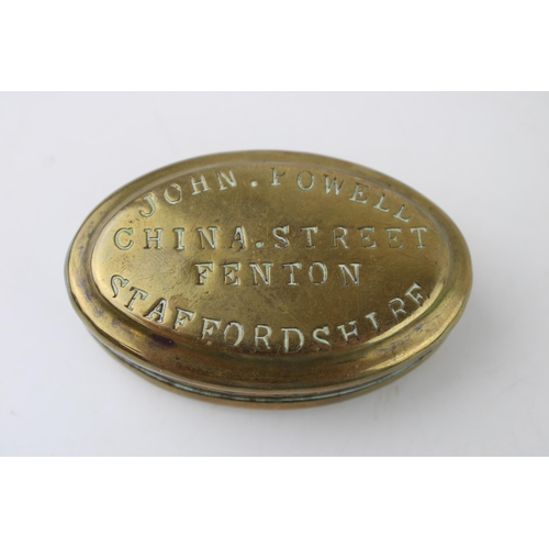 61 - An early c20th brass snuff box or tobacco twist tin inscribed 'John Powell, China Street, Fenton, St... 