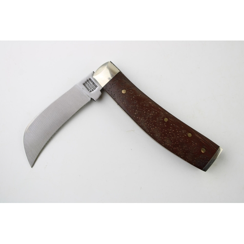 7 - A Wright & Son rosewood handle flat cap pruner pocket knife, Sheffield made. 10.5cm wide, 18cm when ... 