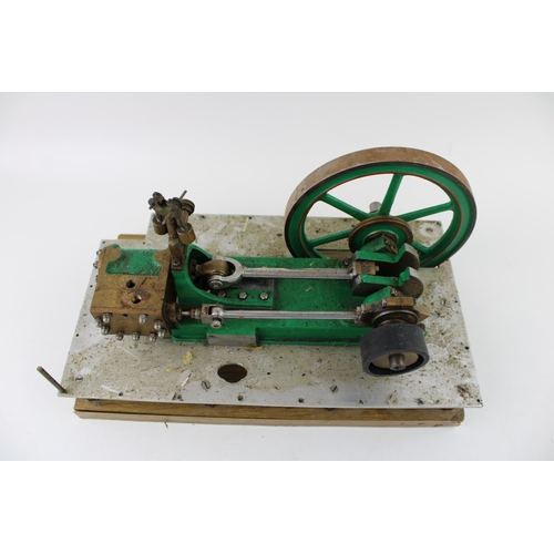 71 - A  model of an stationary horizontal engine mounted on an aluminium base and wooden board. Height 17... 