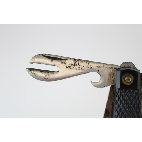 15 - A 1952 dated Army clasp pocket knife by Colin Winand with blade, can opener and marlin spike with la... 