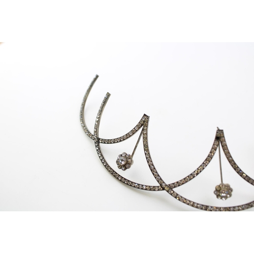 646 - A group of early 20th century tiara's and hair combs, comprising a white metal and paste set example... 